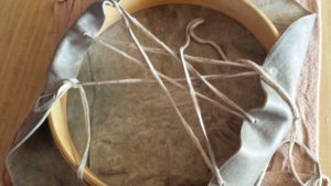 Starting to Lace up Buffalo Hide Drum